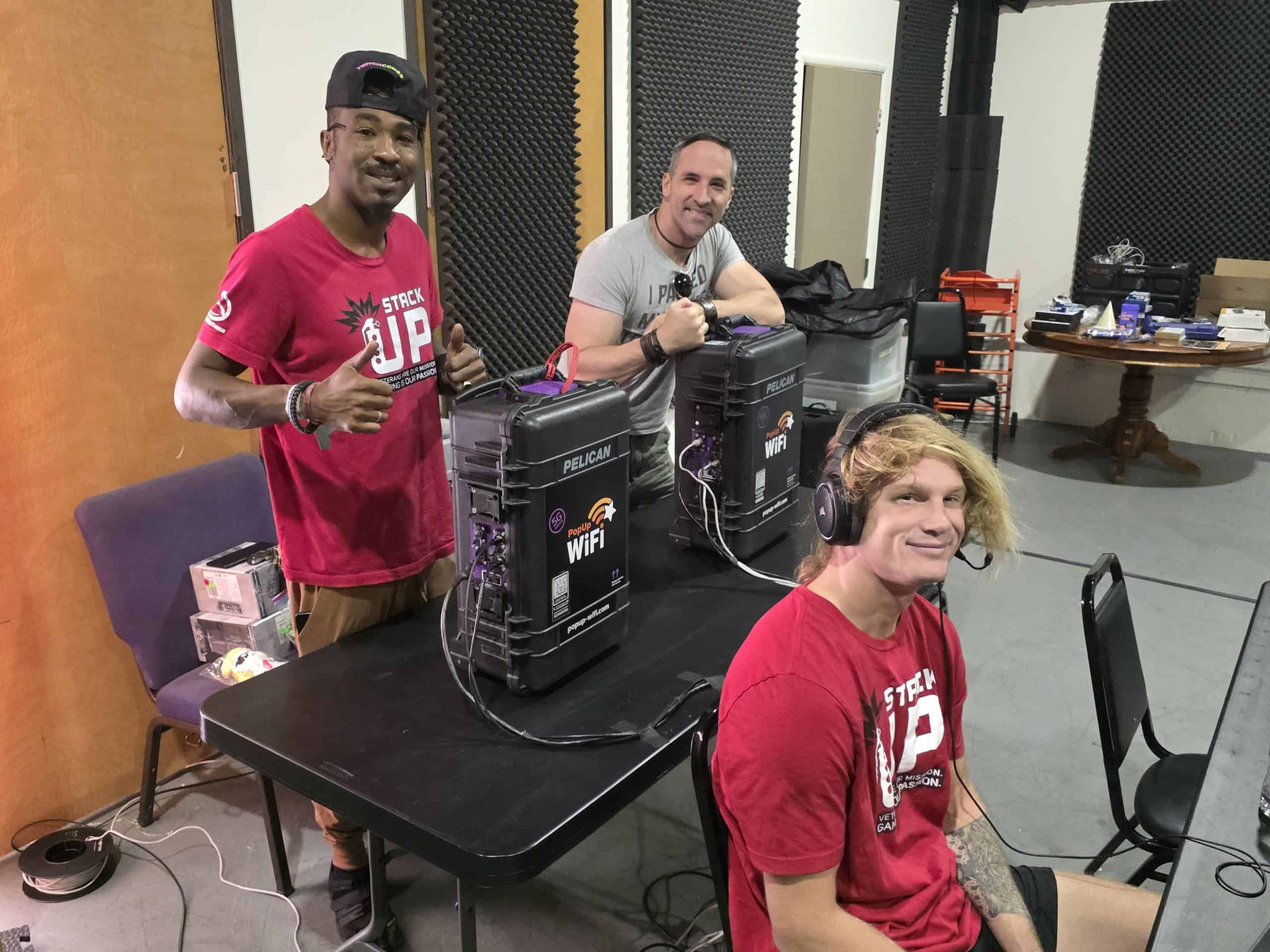 Event organizers with their bonded cellular internet units that they rented to live stream their Twitch fundraising event for StackUp.org