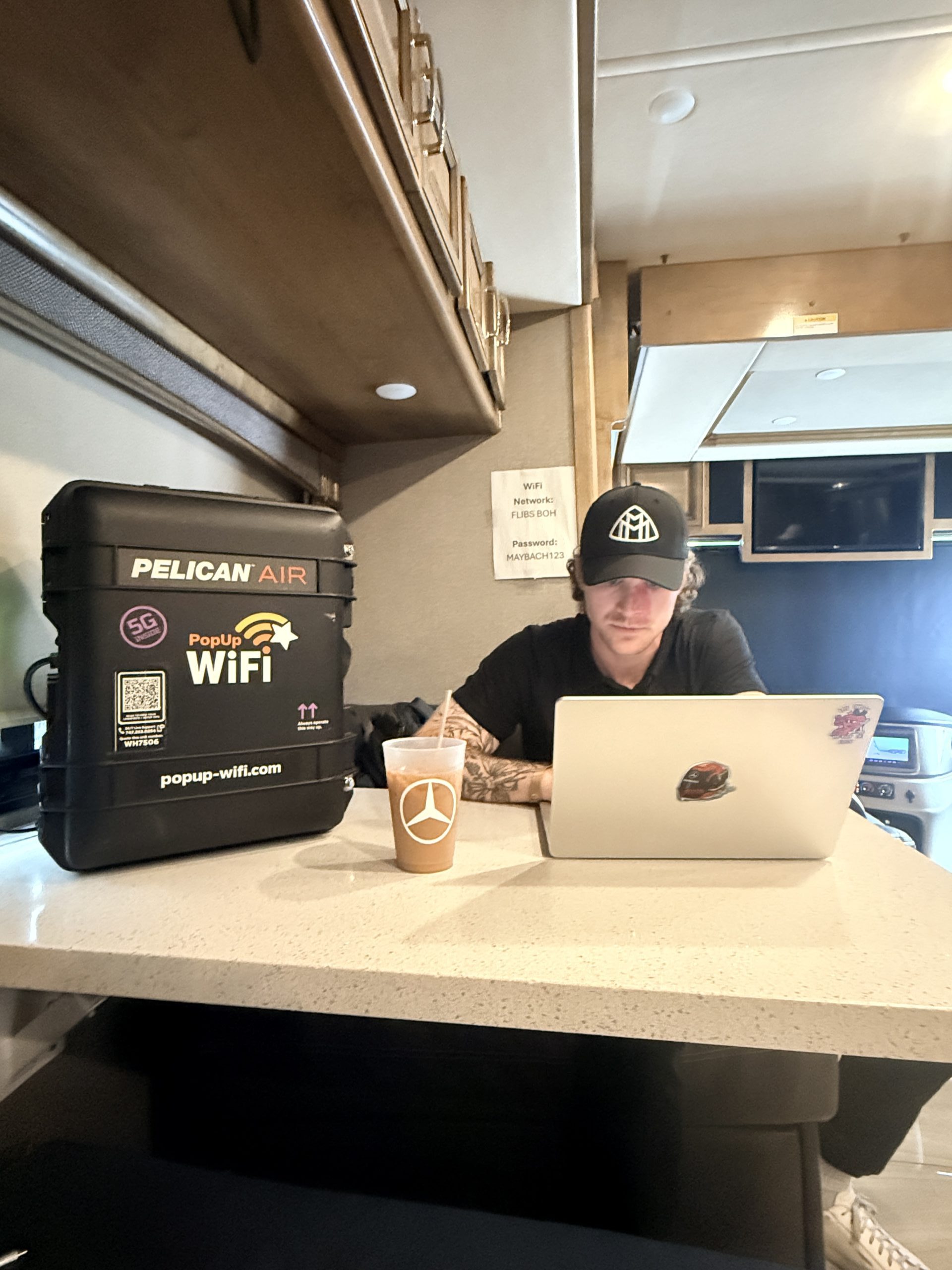 Producer using bonded cellular internet for rent at an event inside an RV for back of house work.