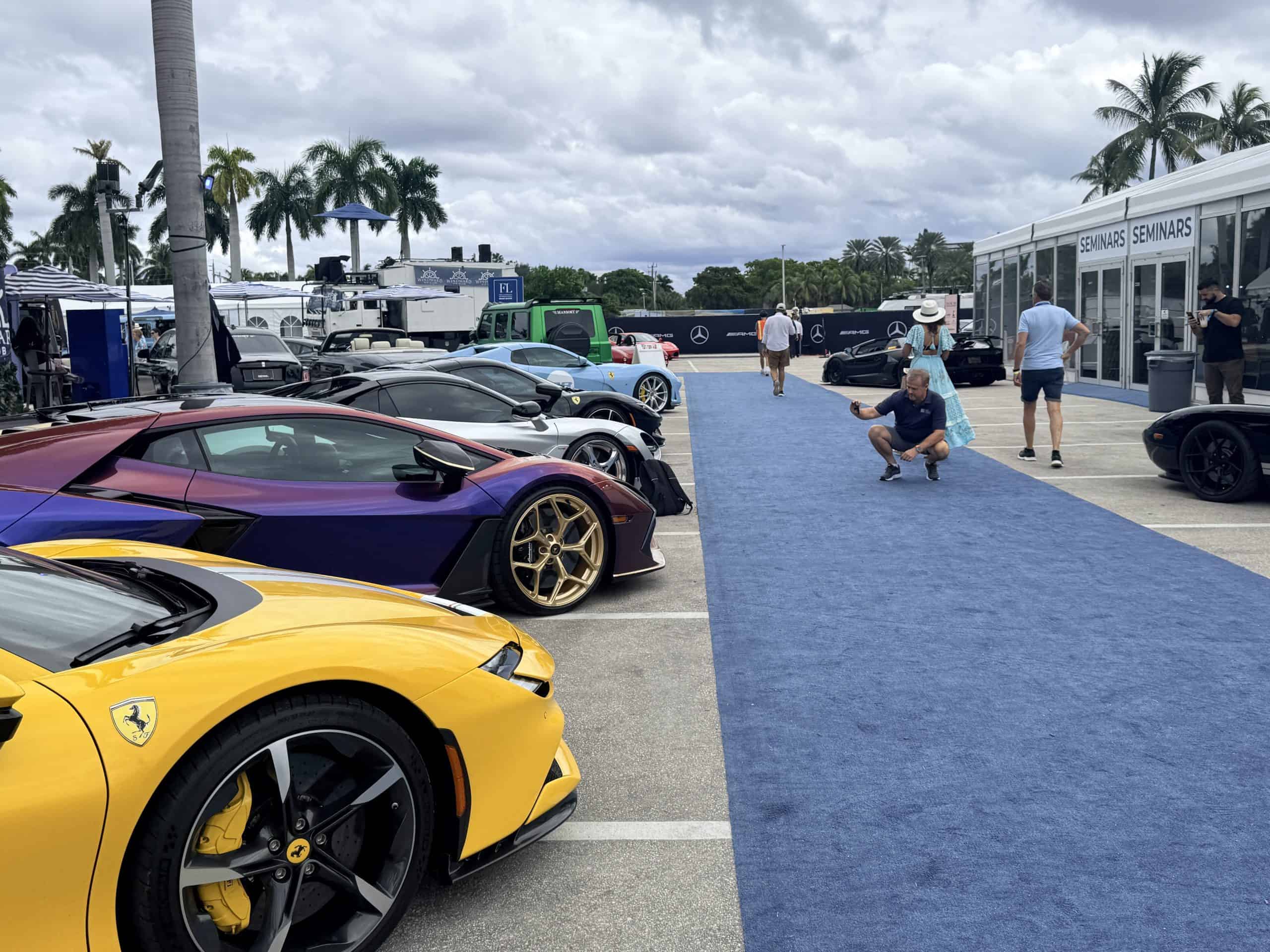 Attendees checking out the cars at FLIP Florida
