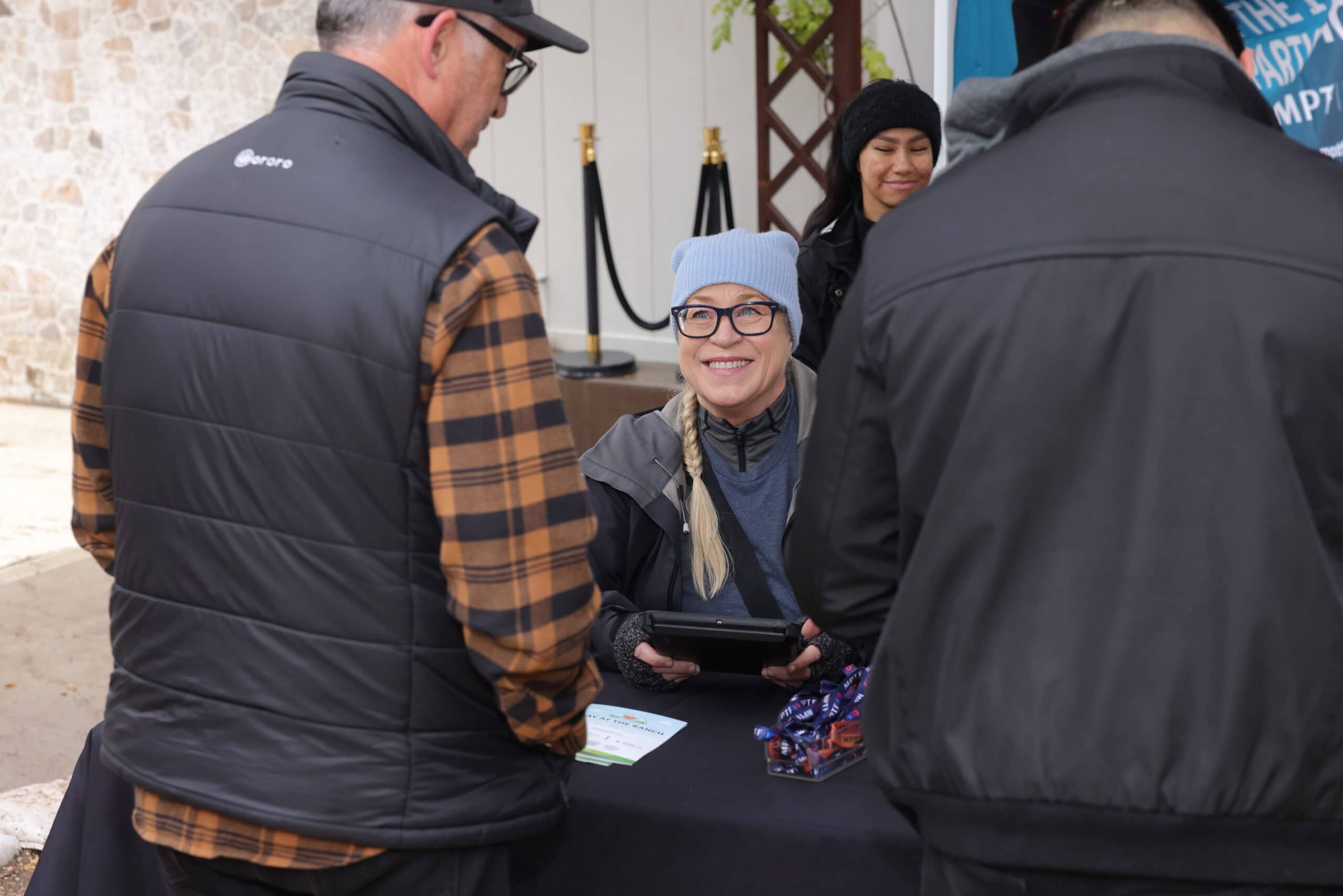 Checking in guests using tablets connected to event internet rental from Los Angeles PopUp WiFi branch.