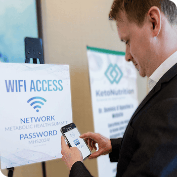 Man at Metabolic Health Summit viewing CAPTIVATE splash screen to connect internet