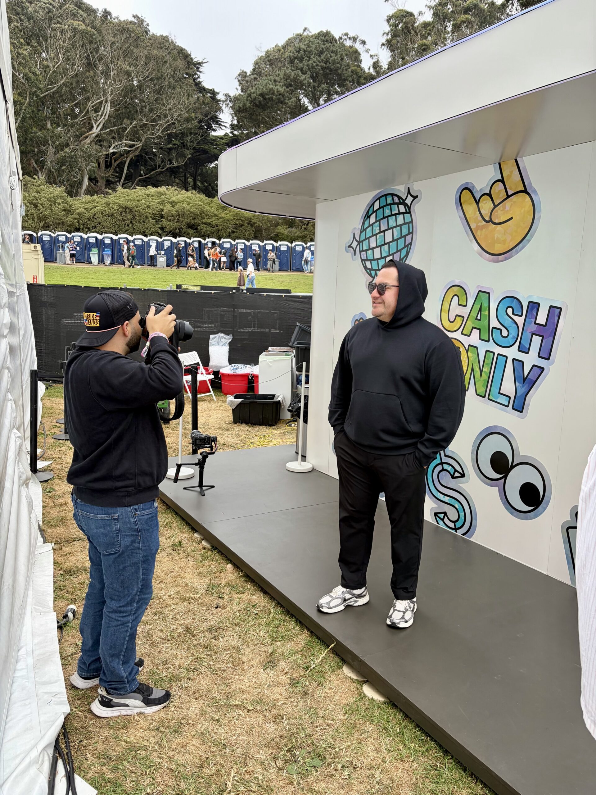 Attendee being photographed receiving a free slushie after completing the app demo at Outside Lands San Francisco