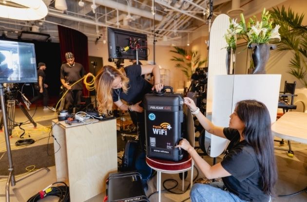 Crew testing dedicated internet connectivity ahead of a live broadcast in Los Angeles